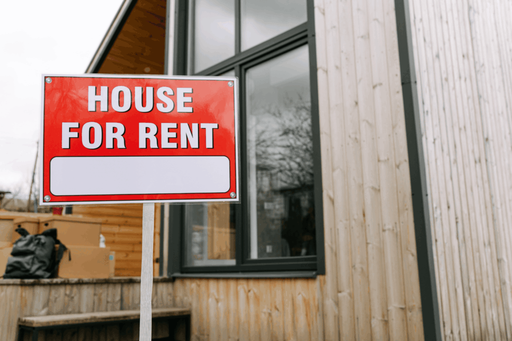 House with a ‘House for Rent’ sign displayed in front of the property.